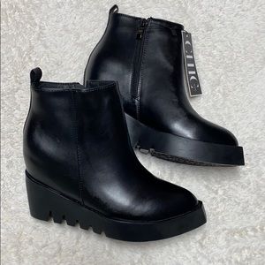 Black wedge booties